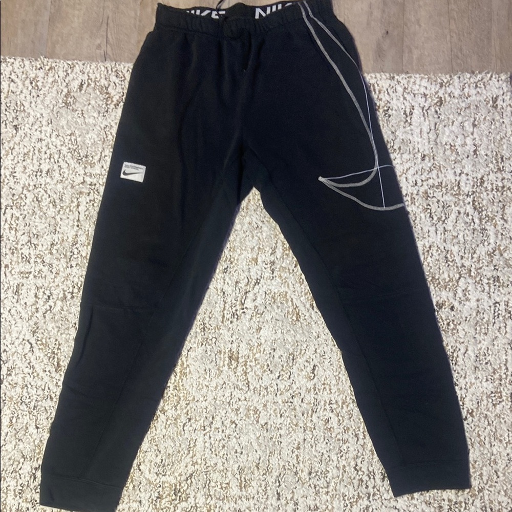 Nike Black Sweatpants with White Accents size:small